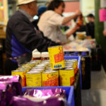 Volunteers distributing food at a food bank facility