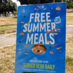 Sign board announcing free summer meals